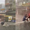 'Sốt' clip 3 thanh niên lao ra cứu chiếc xe máy bị mưa lớn cuốn trôi ở TP.HCM