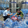 Bơm nước máy vào bình 'phù phép' thành nước Lavie giả bán khắp Hà Nội
