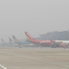 Sương mù dày đặc, nhiều chuyến bay chậm cất, hạ cánh ở Nội Bài