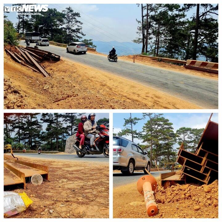 Rào chắn đường bị bỏ dở, các thanh sắt nằm ngay mép đường phơi nắng phơi sương là những cái bẫy 