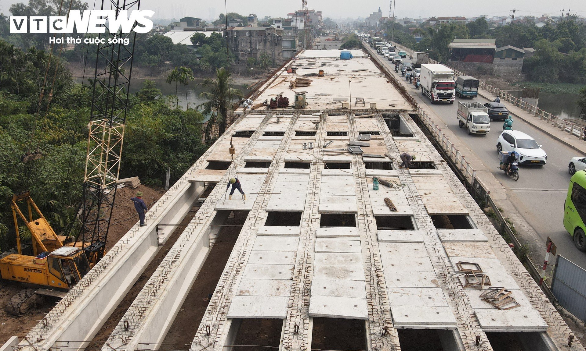 Cây cầu dài hơn 1 km, 4 làn xe dần thành hình ở cửa ngõ phía Tây Hà Nội - 7