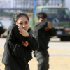 Nữ cảnh sát đặc nhiệm luyện khí công, võ thuật trước APEC