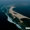 Cồn cát khổng lồ nổi lên giữa biển Cửa Đại hình thành từ đâu?
