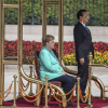 Bà Merkel phải ngồi nghe quốc ca trong chuyến thăm Trung Quốc