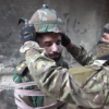 Tàn ác cảnh IS hành quyết lính Syria bằng cách buộc thuốc nổ vào đầu