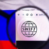 Quyết định loại Nga khỏi SWIFT “phủ bóng” nền kinh tế thế giới