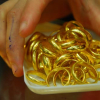 Vì sao phải mua vàng cúng vía Thần Tài để cầu sung túc?