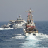Vệ binh Iran chạy cắt mặt tàu tuần tra Mỹ