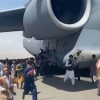Số phận những người đu bám càng máy bay quân sự Mỹ rời Kabul