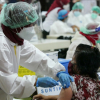 Quốc gia Đông Nam Á đầu tiên tiêm 100 triệu liều vaccine ngừa COVID-19