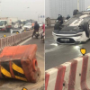 Hà Nội: Nữ tài xế tông vào dải phân cách, ô tô lật ngửa trên cầu Vĩnh Tuy