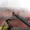 Cháy Trung tâm Thương mại Thế giới ở Hồng Kông, hàng chục người mắc kẹt