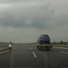 Cục CSGT xử lí người phụ nữ đi xe máy ngược chiều trên cao tốc