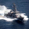 Tàu Mỹ nổ súng bắn cảnh cáo tàu Iran khi bị vây hãm