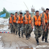 Lũ lụt Trung Quốc: Thực trạng ở nông thôn qua lời kêu gọi trở về cứu đê