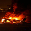 Reuters: 379 hành khách thoát khỏi máy bay Nhật Bản đang cháy một cách thần kỳ