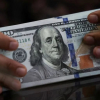 Tài sản Mỹ liên tục bị bán tháo, đồng USD chạm đáy 10 năm so với đồng franc Thụy Sĩ