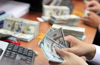 Tỷ giá trung tâm điều chỉnh giảm sau 5 ngày tăng liên tiếp