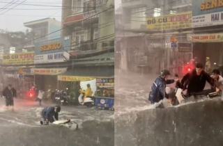 'Sốt' clip 3 thanh niên lao ra cứu chiếc xe máy bị mưa lớn cuốn trôi ở TP.HCM
