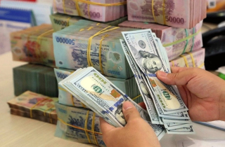 Tỷ giá trung tâm tiếp tục giảm