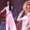 Hương Giang mặc áo dài trắng, dắt xe đạp trên sân khấu Miss Universe